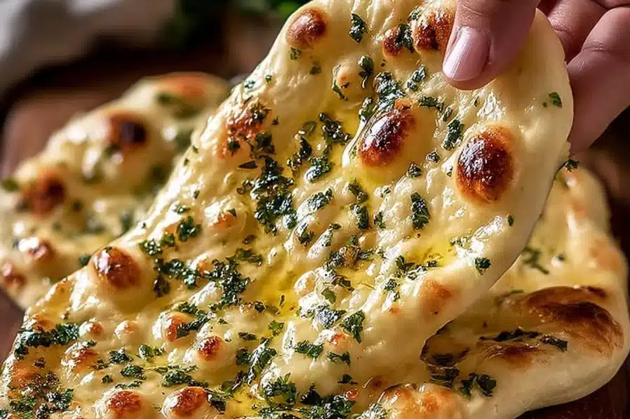 Freshly baked authentic artisan garlic naan served warm