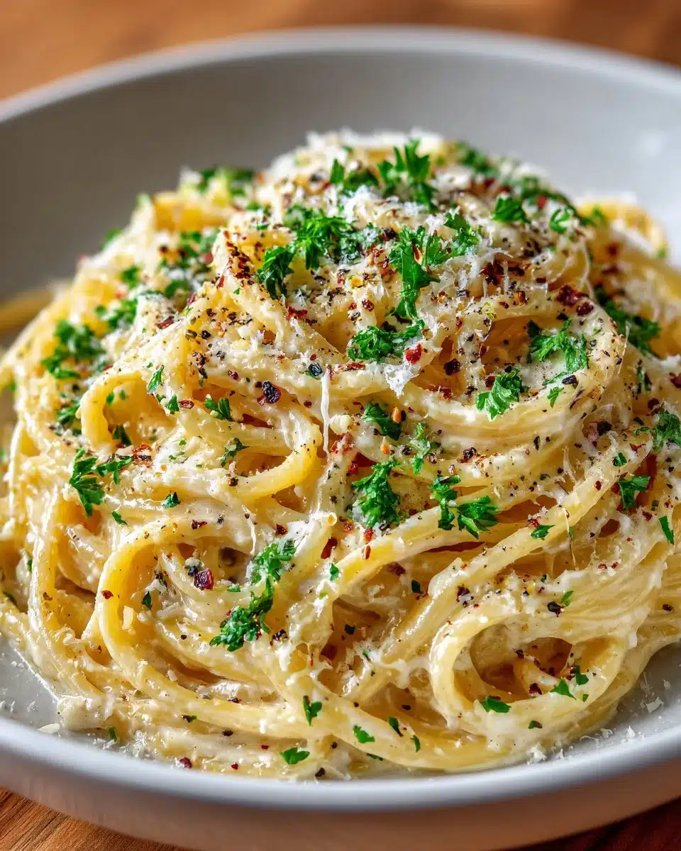 One pot creamy garlic pasta dish with herbs and garlic sauce