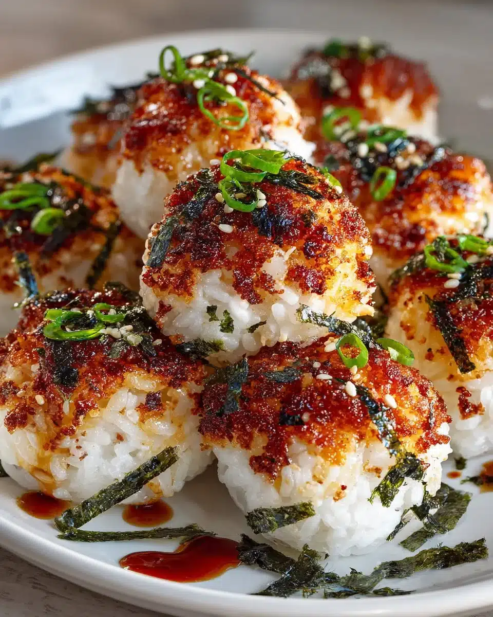 Plate of tasty tuna rice balls garnished with herbs