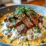 creamy queso rice with juicy steak strips 2026 04 19 220600 819x1024 1