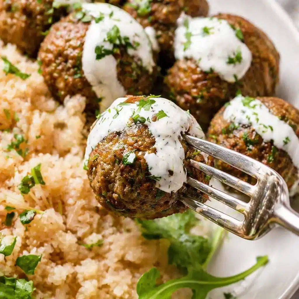 Plate of Healthy Baked Turkey Meatballs with Herbs served with lemon sauce.