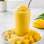 blended frozen pineapple mango smoothie 2026 06 20 155057 683x1024 1