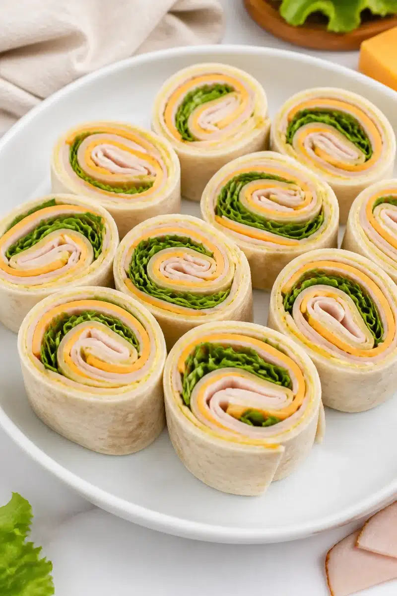 Easy Turkey And Cheddar Roll Ups For Lunchboxes easy turkey and cheddar roll ups for lunchboxes 2026 06 29 191838 2