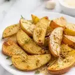 garlic herb roasted potato wedges 2026 06 18 042904 683x1024 1