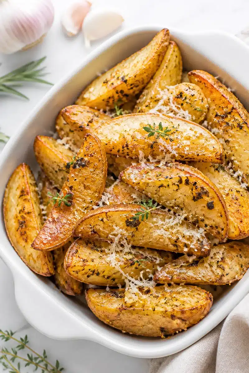 Garlic Herb Roasted Potato Wedges garlic herb roasted potato wedges 2026 06 18 042931 2