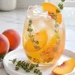 refreshing sparkling peach and thyme mocktail 2026 06 26 211237 683x1024 1