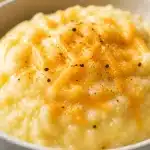 southern style creamy grits with cheddar cheese 2026 06 01 032036 683x1024 1