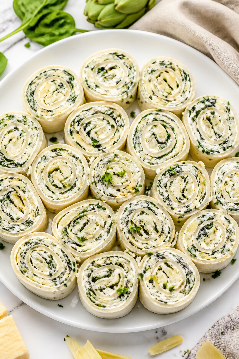 Cheesy Spinach And Artichoke Pinwheel Appetizer