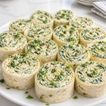 cheesy spinach and artichoke pinwheel appetizer 2026 07 16 025453 683x1024 1