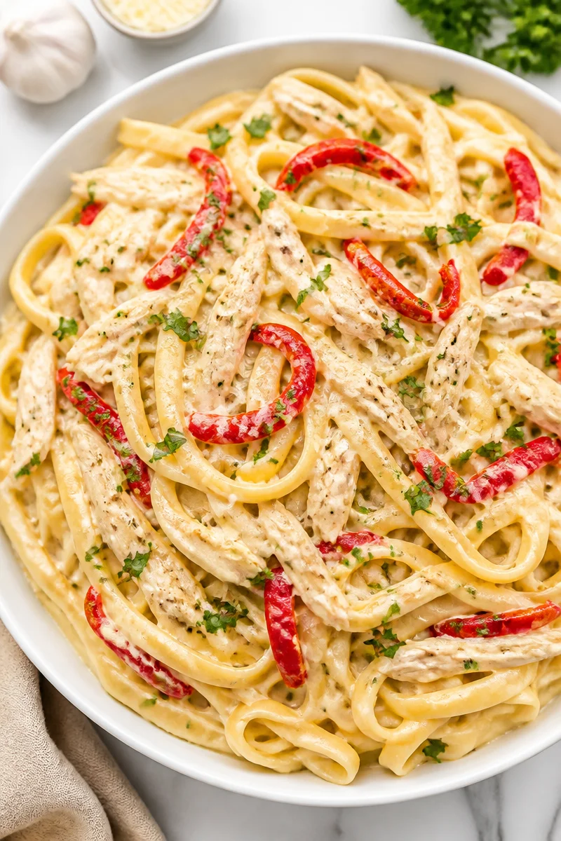 Creamy Alfredo And Roasted Red Pepper Chicken Pasta Recipe creamy alfredo and roasted red pepper chicken past 2026 07 07 032313 2