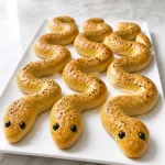 creepy snake shaped garlic breadstick appetizer 2026 07 10 135320 683x1024 1