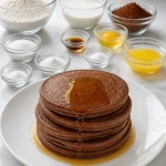 fluffy chocolate pancakes with maple syrup drizzle 2026 07 23 041644 683x1024 1