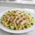 lemon herb chicken couscous bowl with cucumber 2026 07 21 035126 683x1024 1