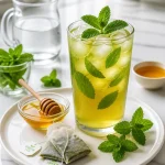 refreshing iced green tea with honey and mint 2026 07 23 041648 683x1024 1
