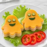 spooky ghost shaped cheddar cheese sandwich lunch 2026 07 10 135340 683x1024 1