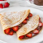 sweet strawberry and nutella filled crepe breakfas 2026 07 15 023913 683x1024 1