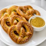 homemade soft pretzels with spicy mustard dip 2026 07 25 043250 683x1024 1