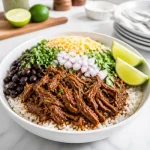 slow cooker beef barbacoa taco bowl 2026 08 28 151145 683x1024 1