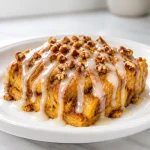 baked pumpkin cinnamon roll casserole 2026 08 29 124531 683x1024 1