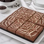 gooey spiderweb chocolate cheesecake bars 2026 09 09 010459 683x1024 1